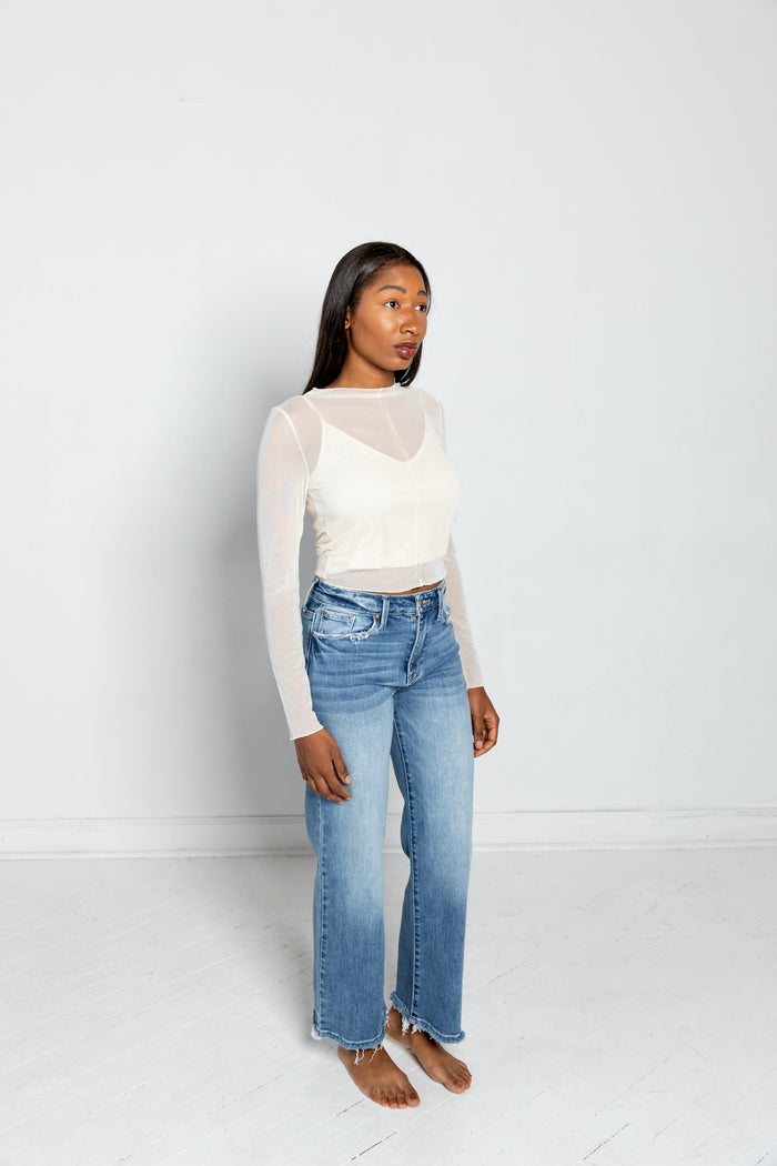 wide leg straight jean frayed hem 90s style denim front