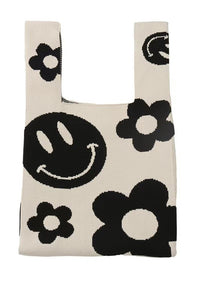 black white small tote bag smiley face  Edit alt text